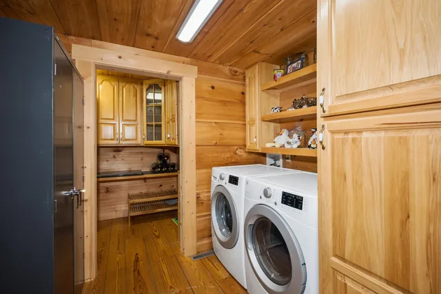 a living room with furniture fireplace and flat screen tv