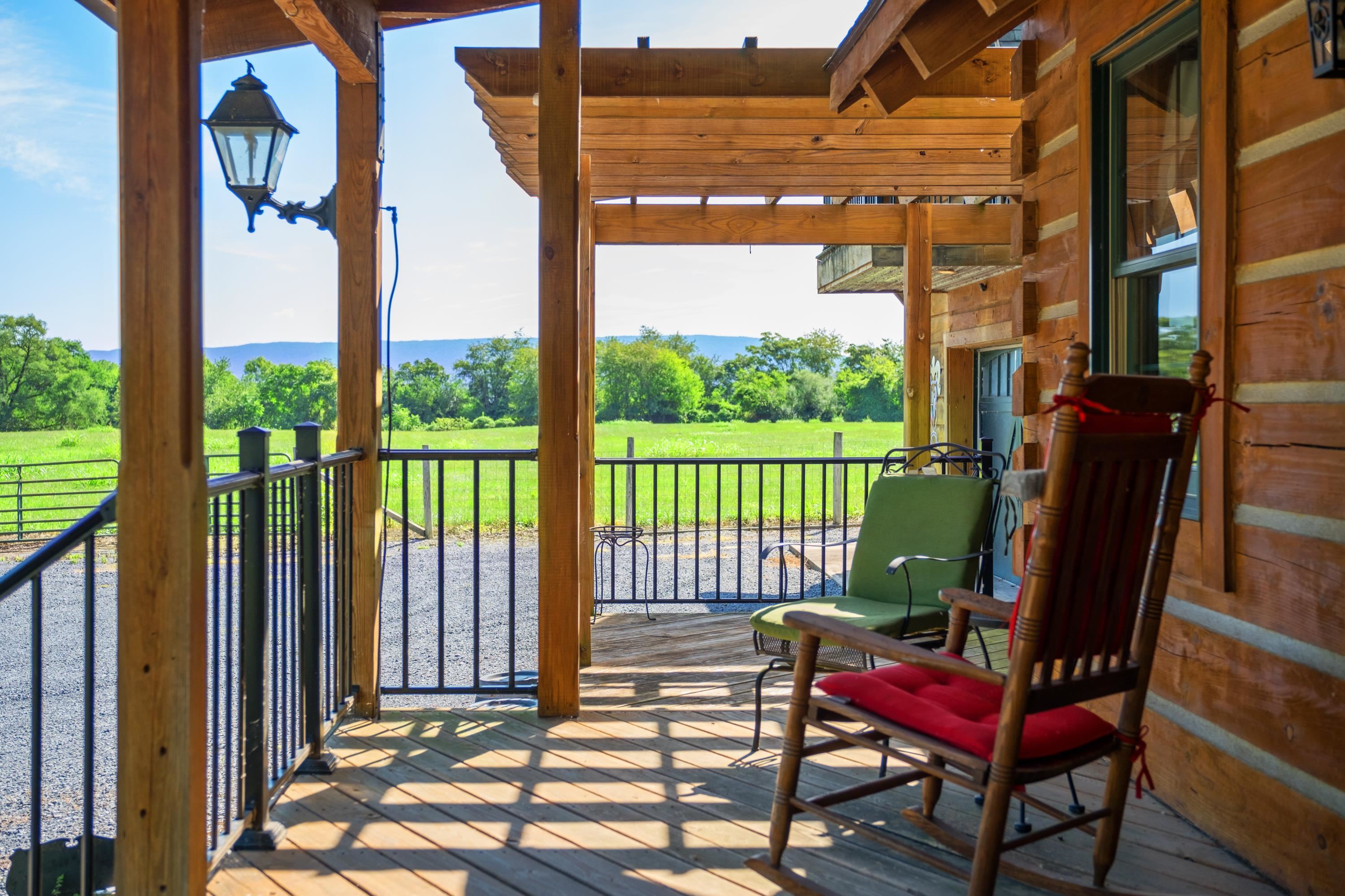 14238 Plains Mill Road Timberville, VA 22853 - Photo 46 of 68 a view of a two chairs in the porch