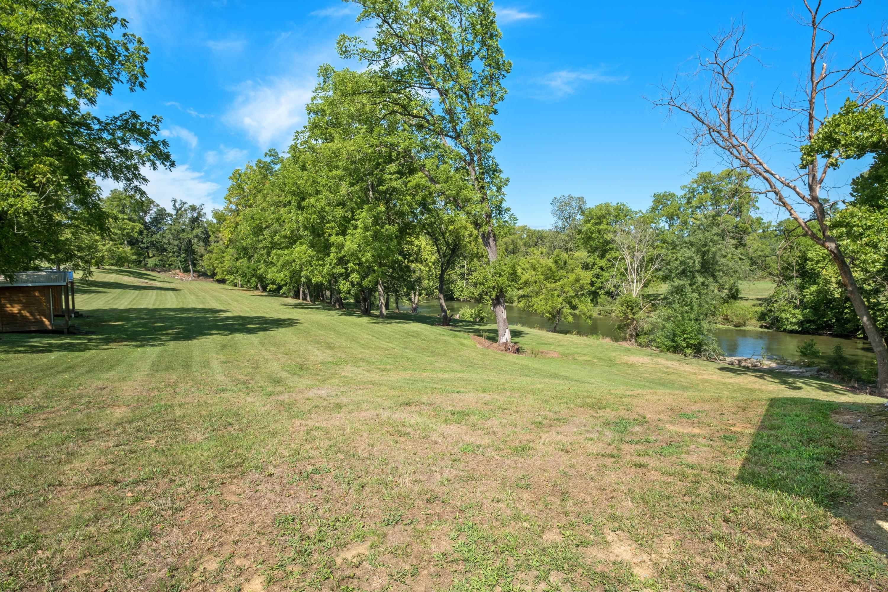 14238 Plains Mill Road Timberville, VA 22853 - Photo 68 of 68 a view of a field with trees in the background