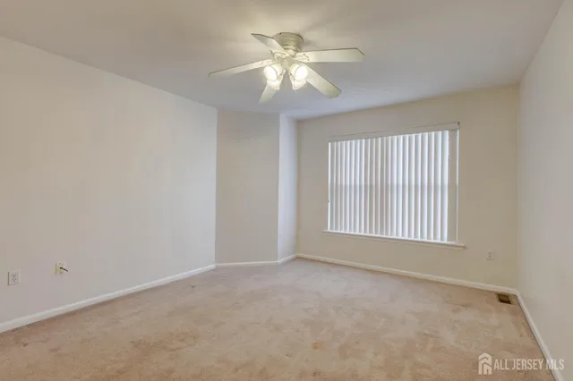 a bathroom with a bathtub and a toilet