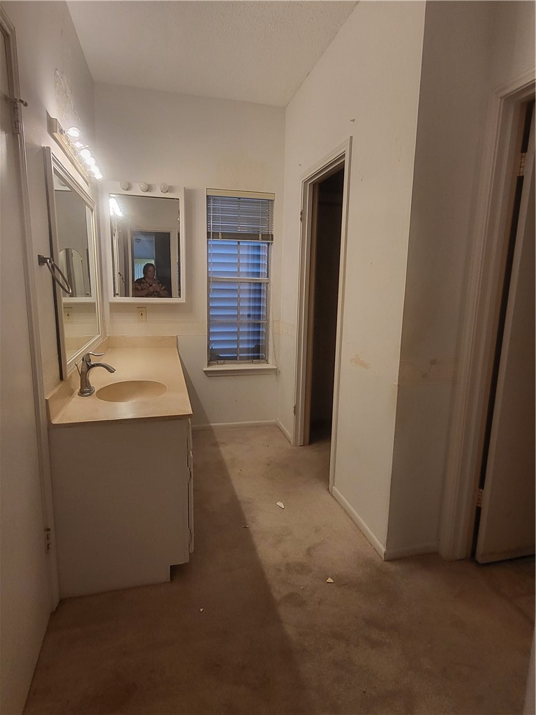3025 Quail Springs Road, Unit L2 Corpus Christi, TX 78414 - Photo 11 of 19 a view of storage and utility room with a sink