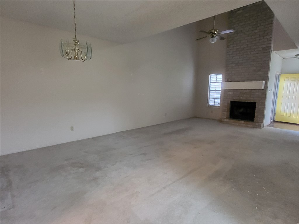 3025 Quail Springs Road, Unit L2 Corpus Christi, TX 78414 - Photo 9 of 19 a view of empty room with a fireplace