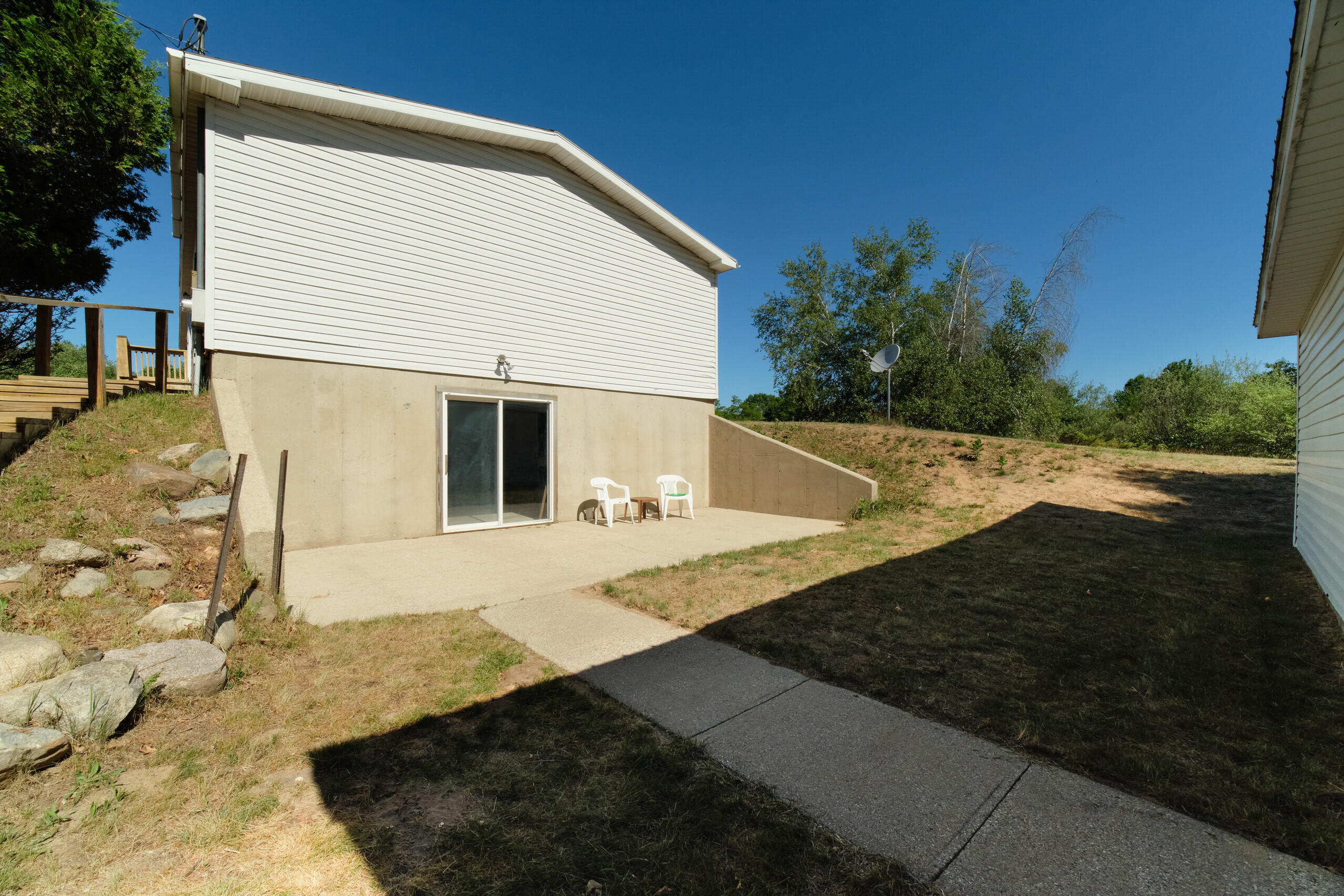 2606 South County Line Road Manistee, MI 49660 - Photo 38 of 49 Walk out from Basement & Patio