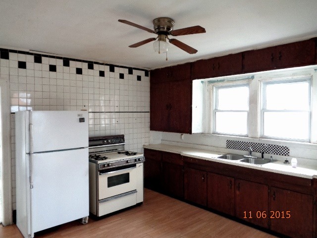292 West Cermak Road Braidwood, IL 60408 - Photo 5 of 25 a kitchen with granite countertop a sink stainless steel appliances and cabinets