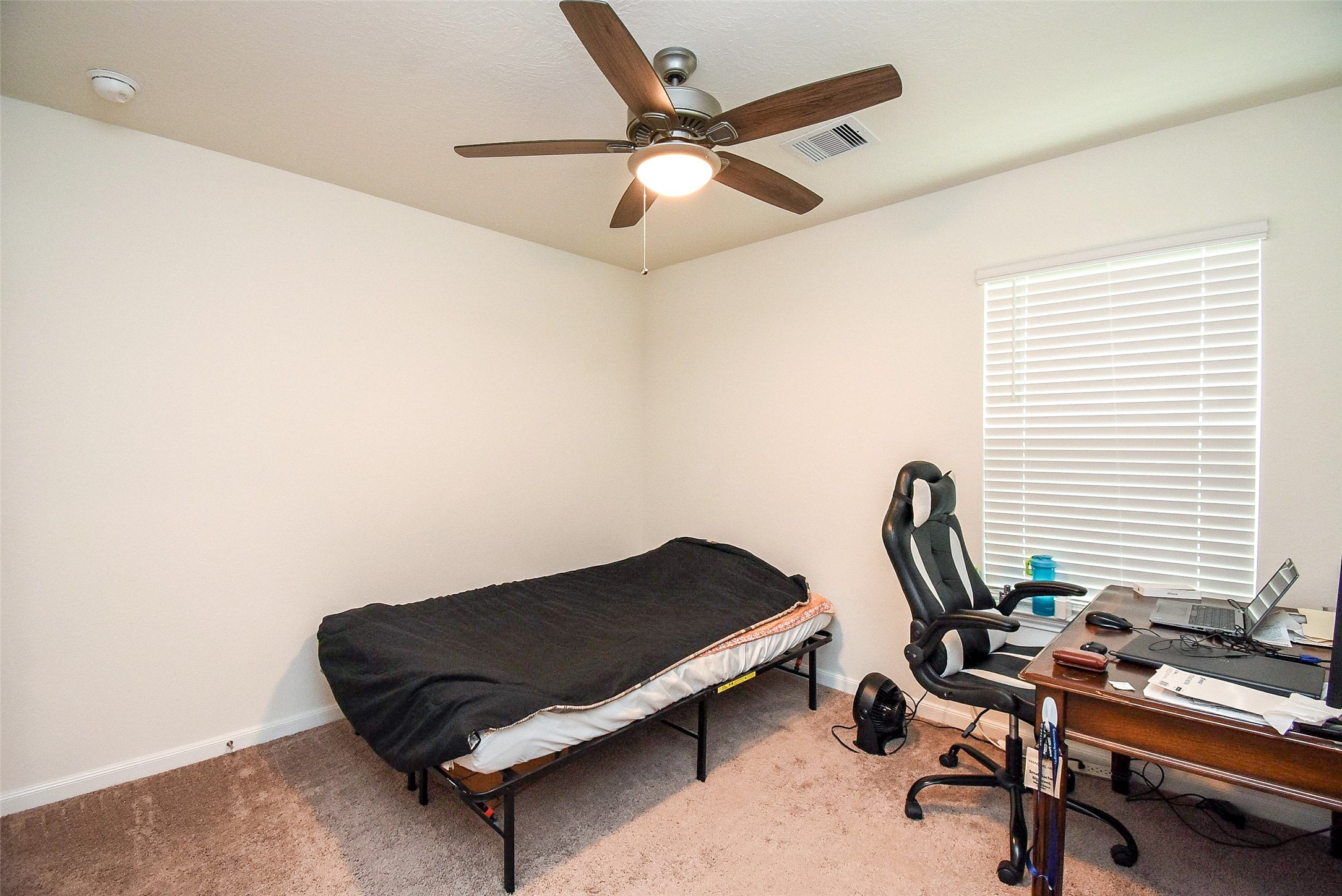 5912 Whitewing Road Rosenberg, TX 77469 - Photo 22 of 25 a view of a workspace with furniture
