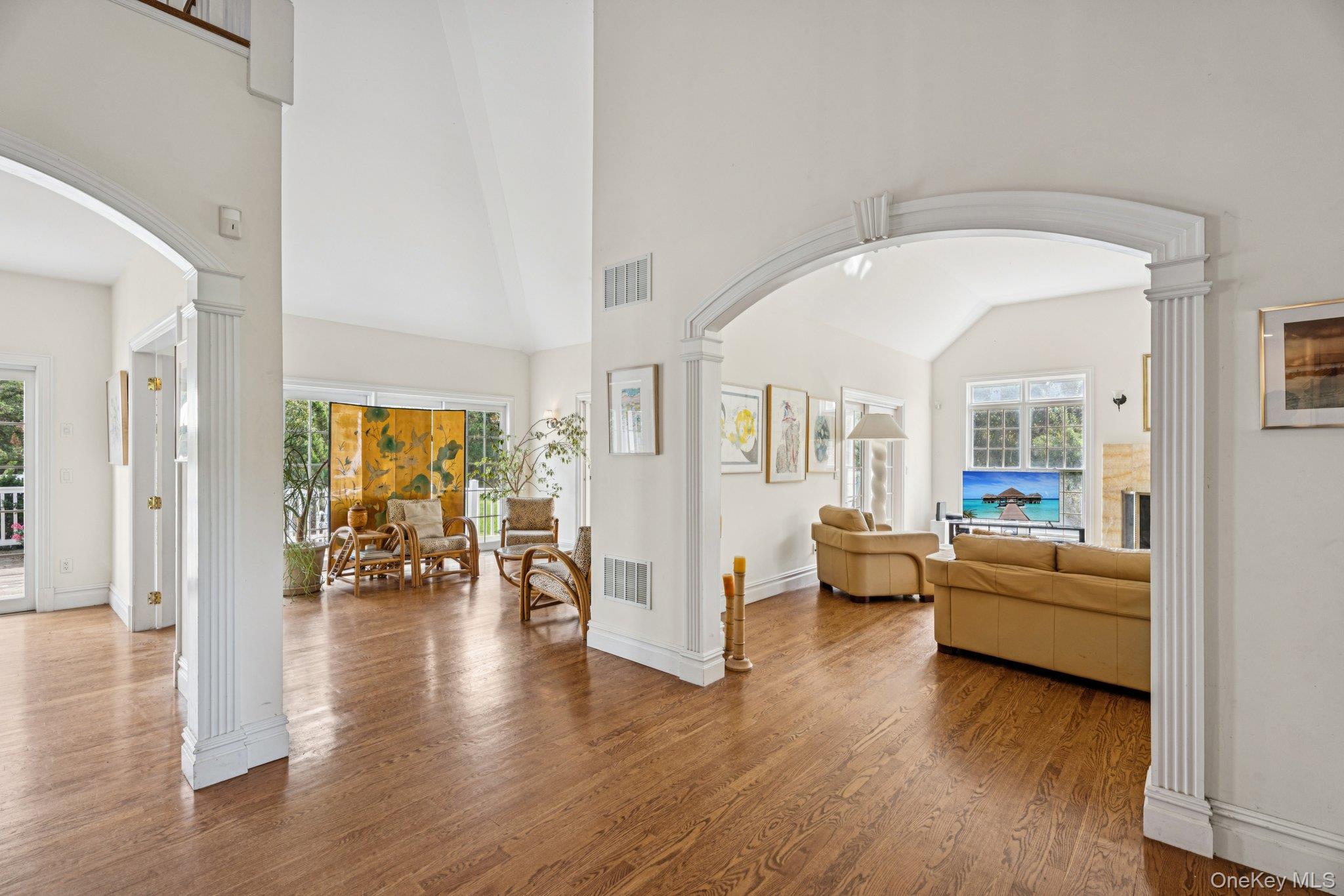 12 Laila Lane Remsenburg, NY 11960 - Photo 4 of 50 a living room with furniture and wooden floor