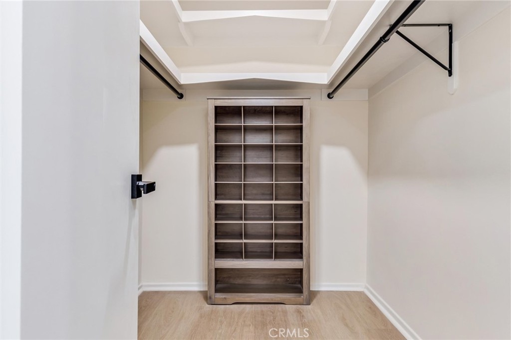 4533 Ironwood Avenue Seal Beach, CA 90740 - Photo 19 of 24 a view of walk in closet with empty racks