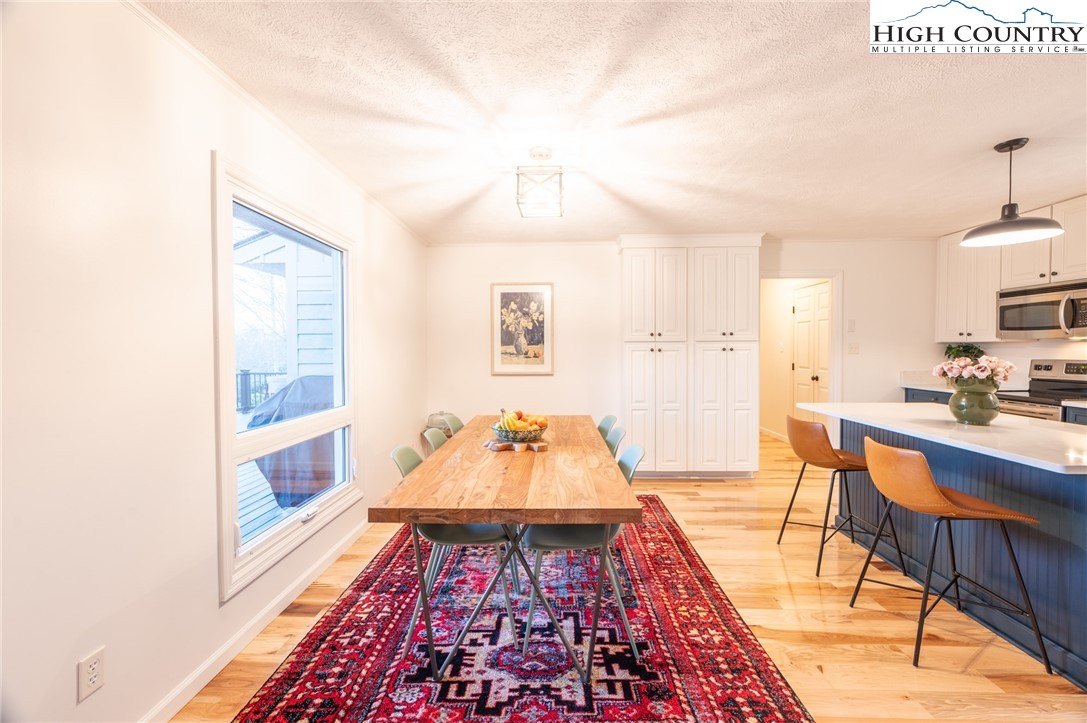 197 Sierra Vista Boone, NC 28607 - Photo 19 of 41 a living room with a rug and wooden floor