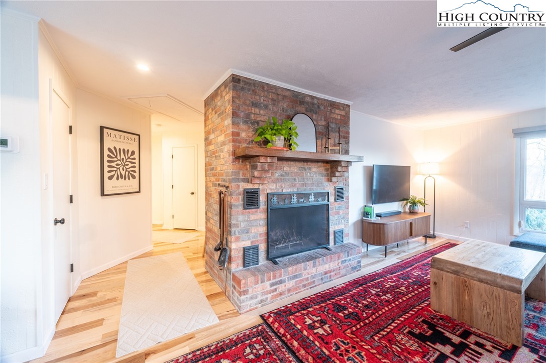 197 Sierra Vista Boone, NC 28607 - Photo 21 of 41 a living room with furniture and a fireplace