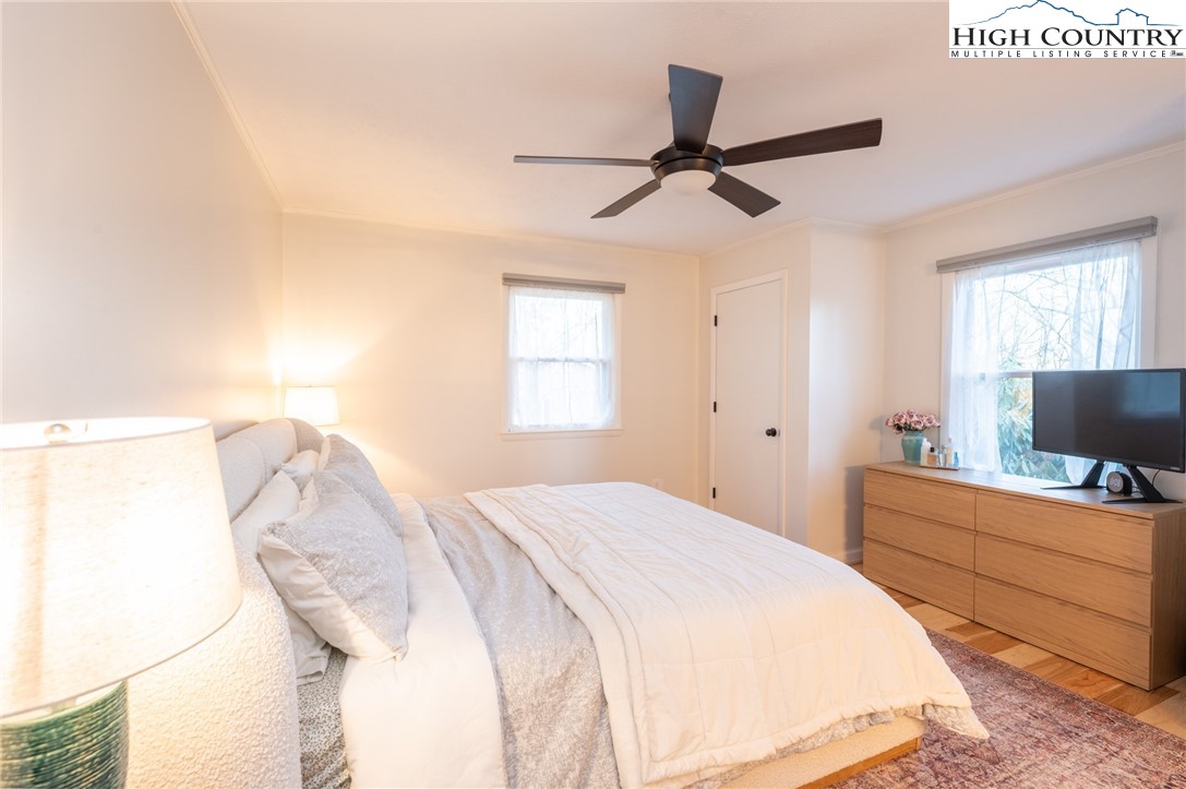 197 Sierra Vista Boone, NC 28607 - Photo 25 of 41 a bedroom with a bed and a flat tv screen on the dresser