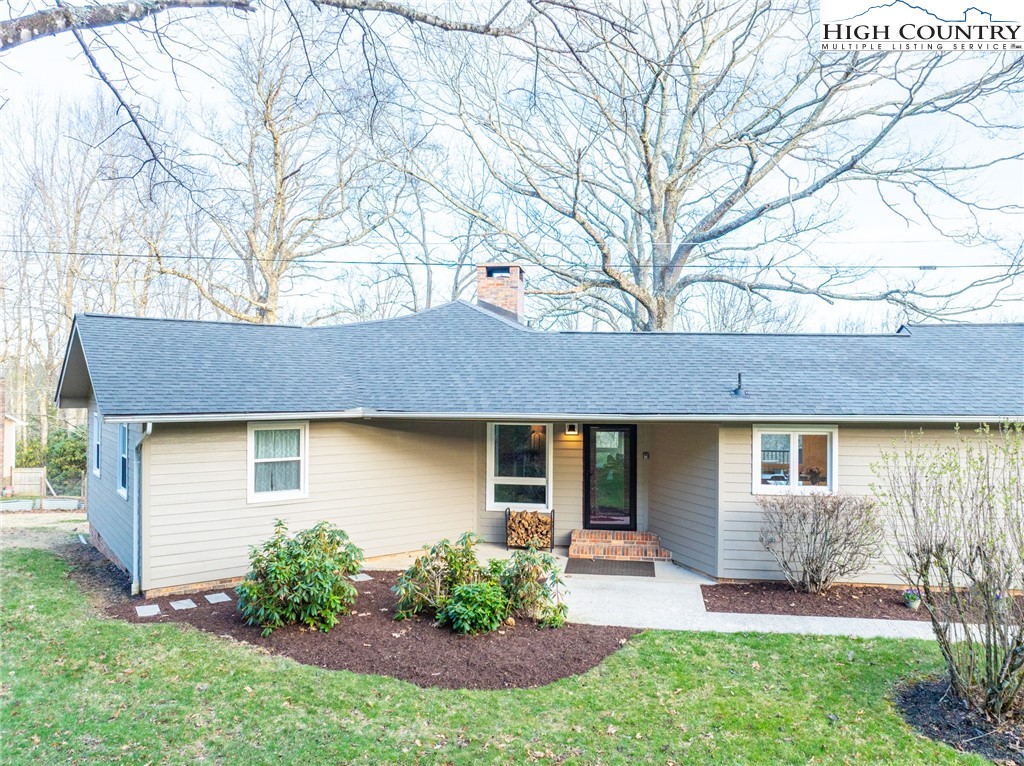197 Sierra Vista Boone, NC 28607 - Photo 3 of 41 a front view of a house with garden