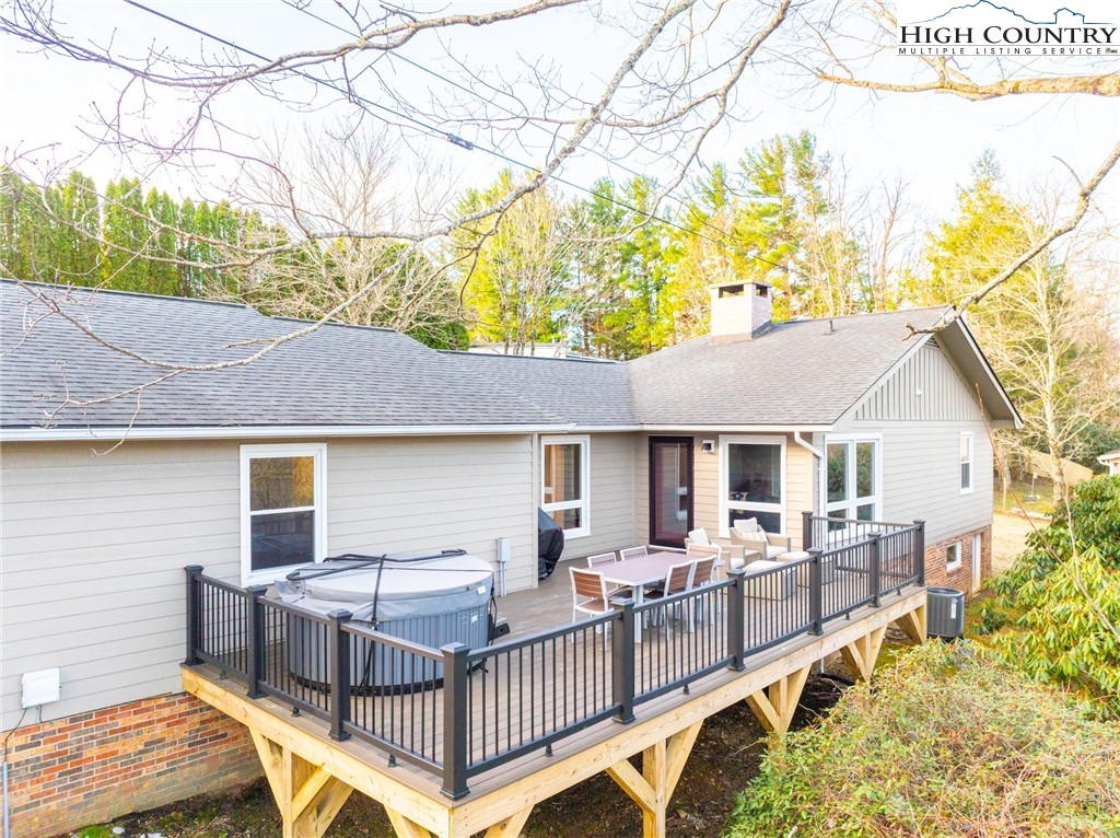 197 Sierra Vista Boone, NC 28607 - Photo 5 of 41 a view of a house with wooden deck and furniture