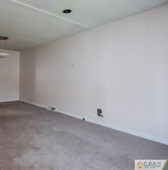 385 Florida Grove Road Perth Amboy, NJ 08861 - Photo 4 of 13 a view of an empty room