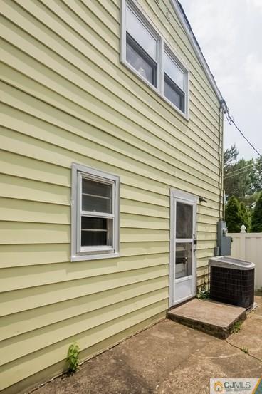 385 Florida Grove Road Perth Amboy, NJ 08861 - Photo 6 of 13 a view of a house with a door and a window