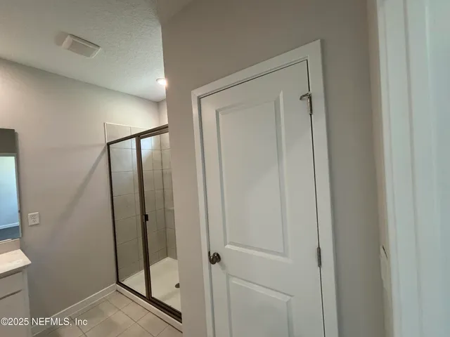 a view of a room with racks on the wall