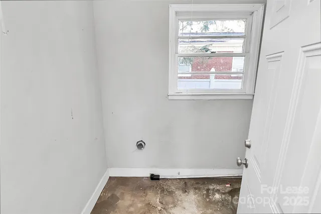 a view of a window in an empty room