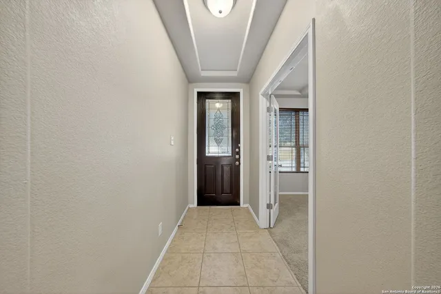a view of hallway with stairs