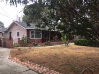 20860 McClellan Road Cupertino, CA 95014 - Photo 2 of 6 a front view of house with yard and trees around