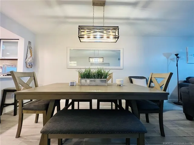 a view of a dining room with furniture