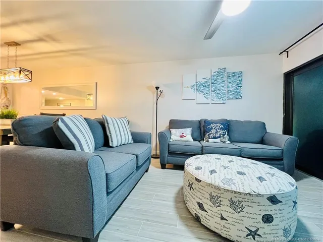 a living room with furniture and a couch