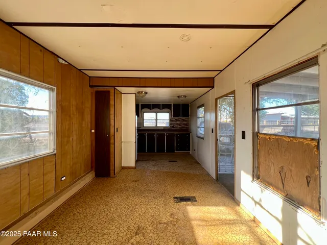 a view of gallery with windows