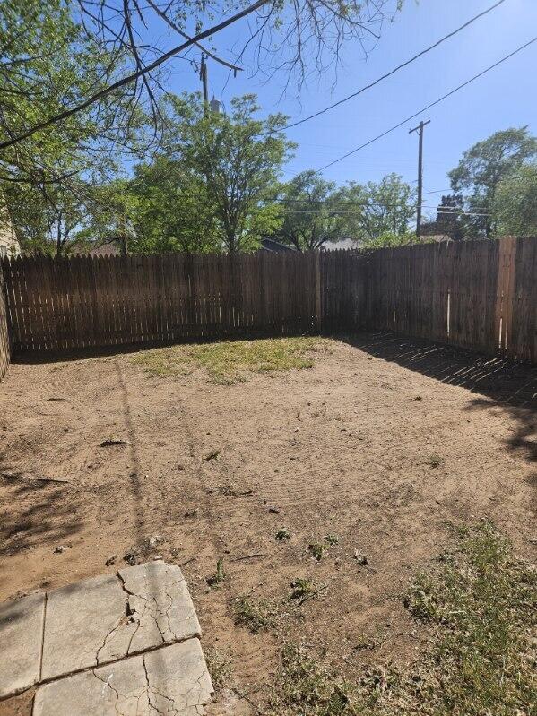 2205 25th Street, Unit FRONT Lubbock, TX 79411 - Photo 15 of 17 a view of wooden fence