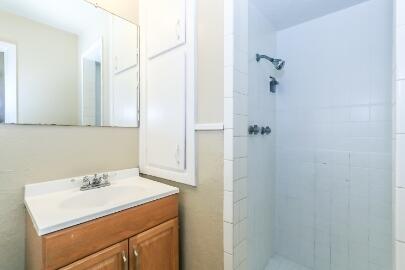 5408 31st Street Lubbock, TX 79407 - Photo 19 of 33 a bathroom with a sink and vanity