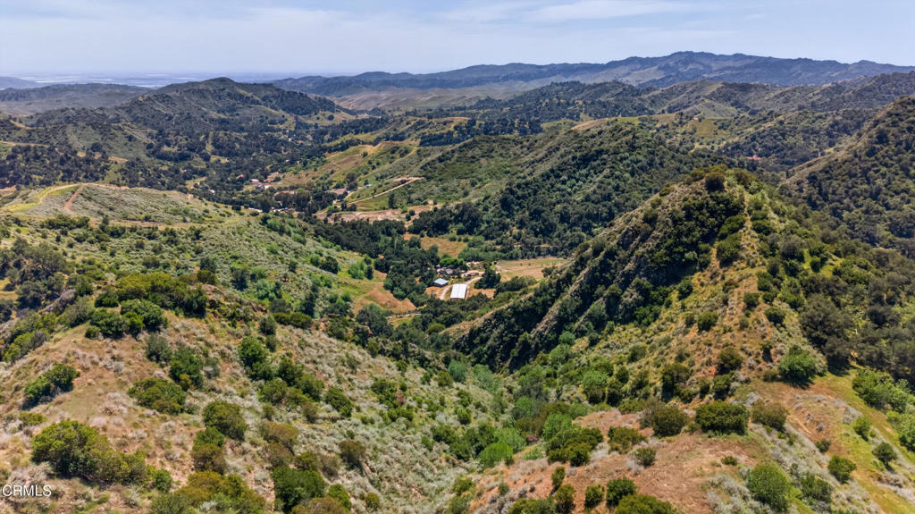 8416 Wheeler Canyon Road Santa Paula, CA 93060 - Photo 1 of 48 an aerial view of residential house and green space