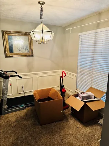 a living room with furniture and window