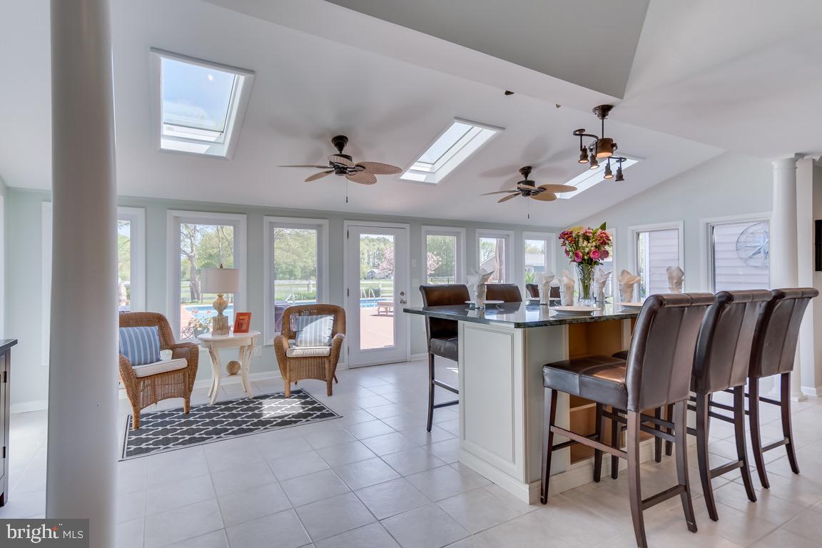 107 Jones Road Chester, MD 21619 - Photo 23 of 64 Sunroom. Exit to pool area.