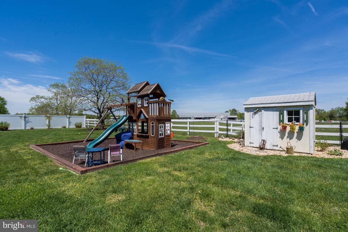 107 Jones Road Chester, MD 21619 - Photo 60 of 64 Play house and play yard equipment.