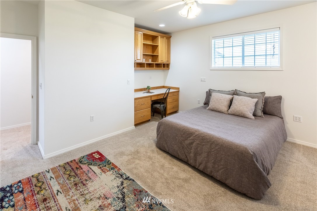 9147 Benson Road Lynden, WA 98264 - Photo 26 of 40 a room with a table and a window