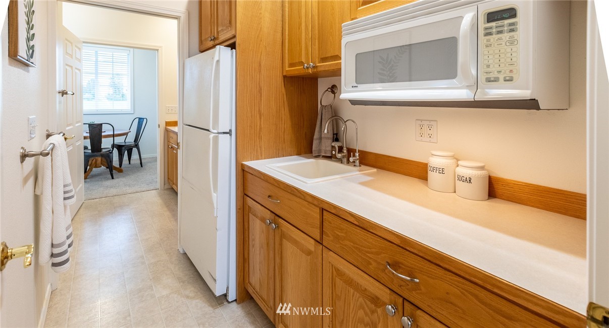 9147 Benson Road Lynden, WA 98264 - Photo 29 of 40 a spacious bathroom with a double vanity sink a mirror and a shower