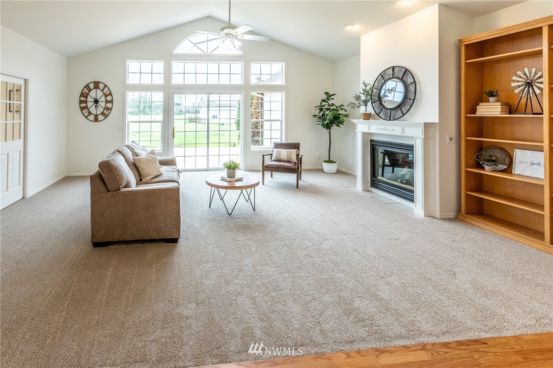 9147 Benson Road Lynden, WA 98264 - Photo 7 of 40 a living room with furniture and a large window
