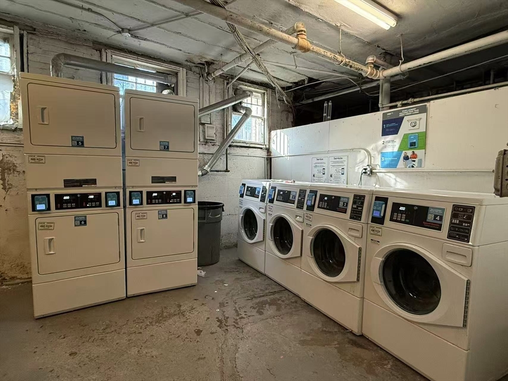 32 Sidlaw Road, Unit 6 Boston, MA 02135 - Photo 15 of 16 a utility room with dryer and washer