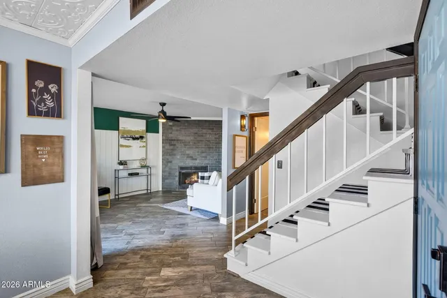 a view of a dining room with furniture and window