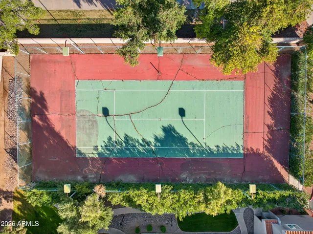 a view of a patio with swimming pool