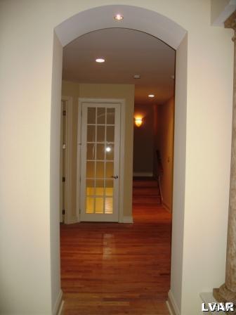 3620 Manor Road Bethlehem, PA 18020 - Photo 32 of 47 Hall (hardwood floors) to back stairway to lower l
