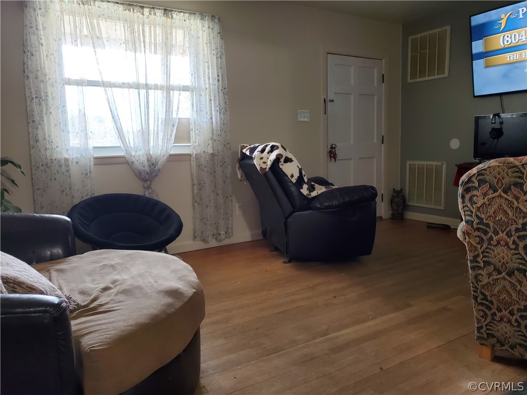 7469 Strath Road Henrico, VA 23231 - Photo 3 of 18 a living room with furniture and a window