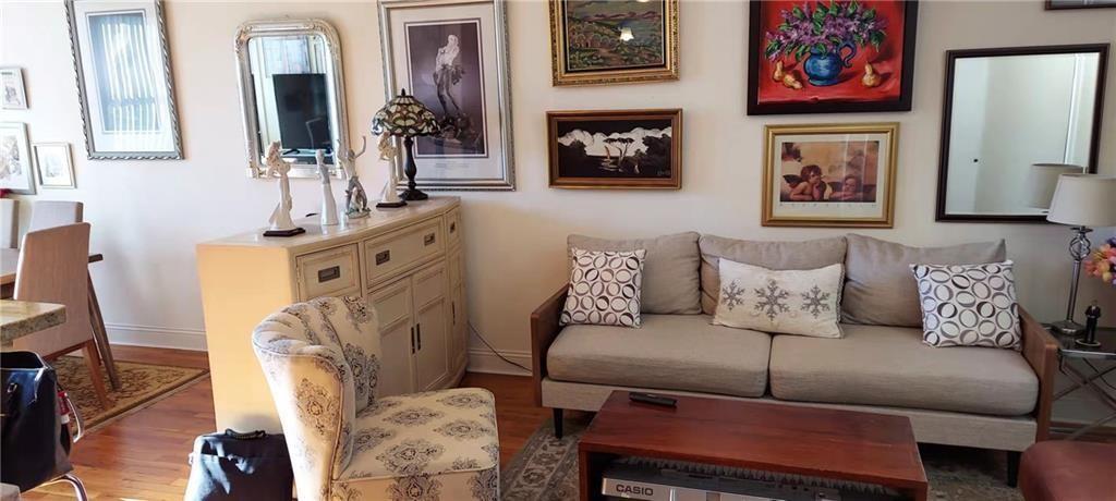 275 Webster Avenue, Unit 2K Brooklyn, NY 11230 - Photo 14 of 22 a living room with furniture and a fireplace