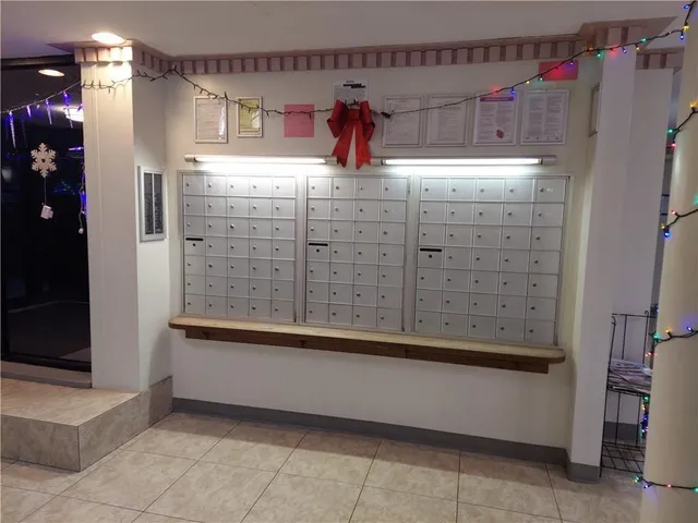 a utility room with closet dryer and washer