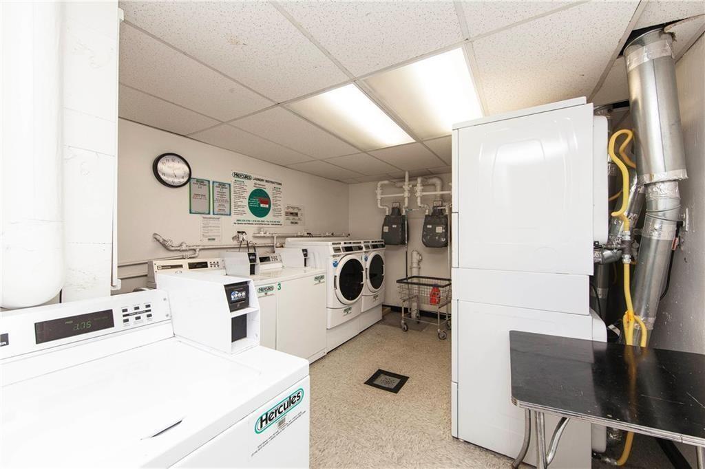 275 Webster Avenue, Unit 2K Brooklyn, NY 11230 - Photo 9 of 22 a utility room with closet dryer and washer