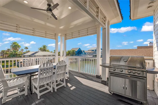 a view of a balcony with furniture