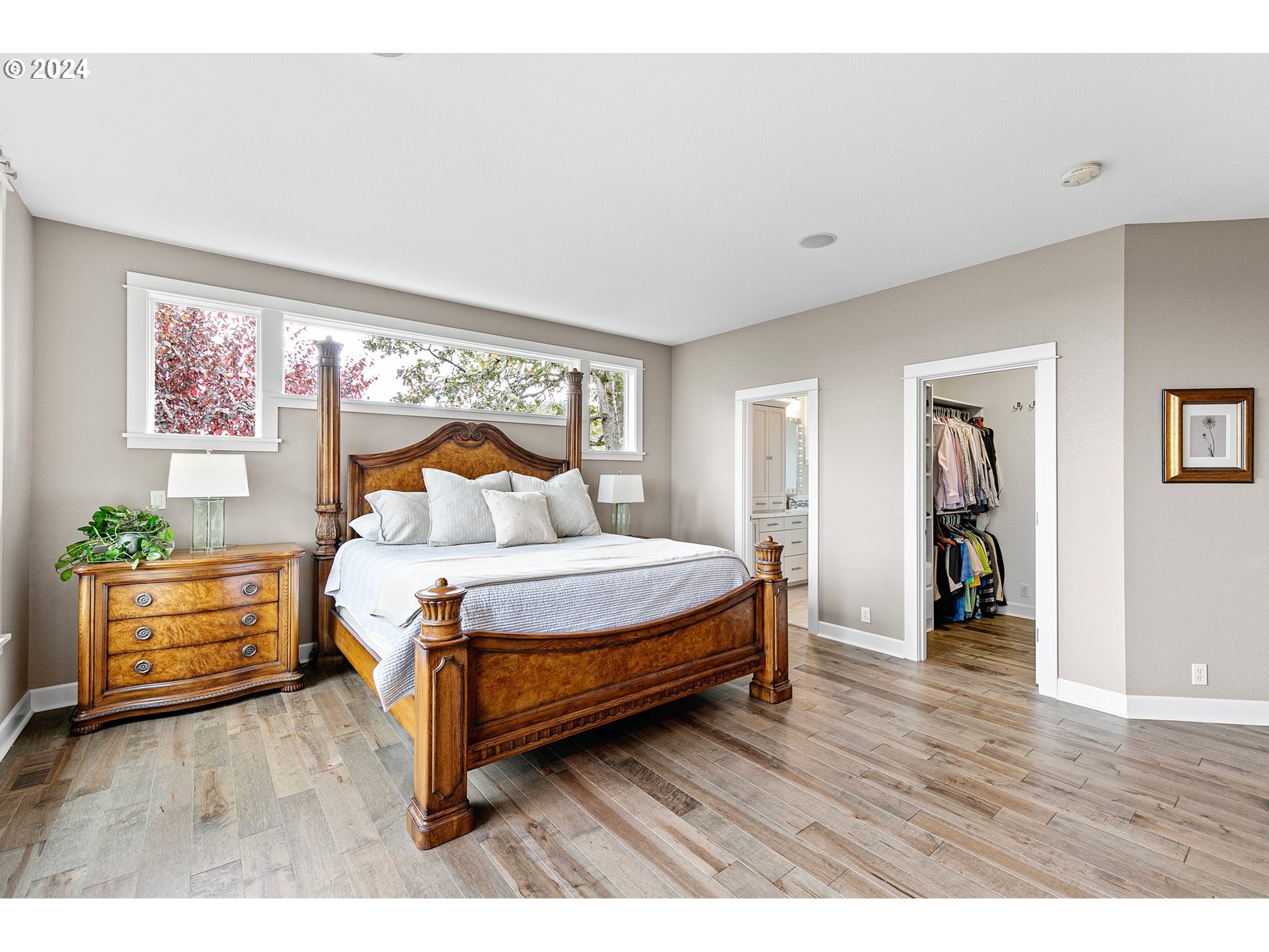 3321 Bentley Avenue Eugene, OR 97405 - Photo 17 of 48 a bedroom with a bed and wooden floor