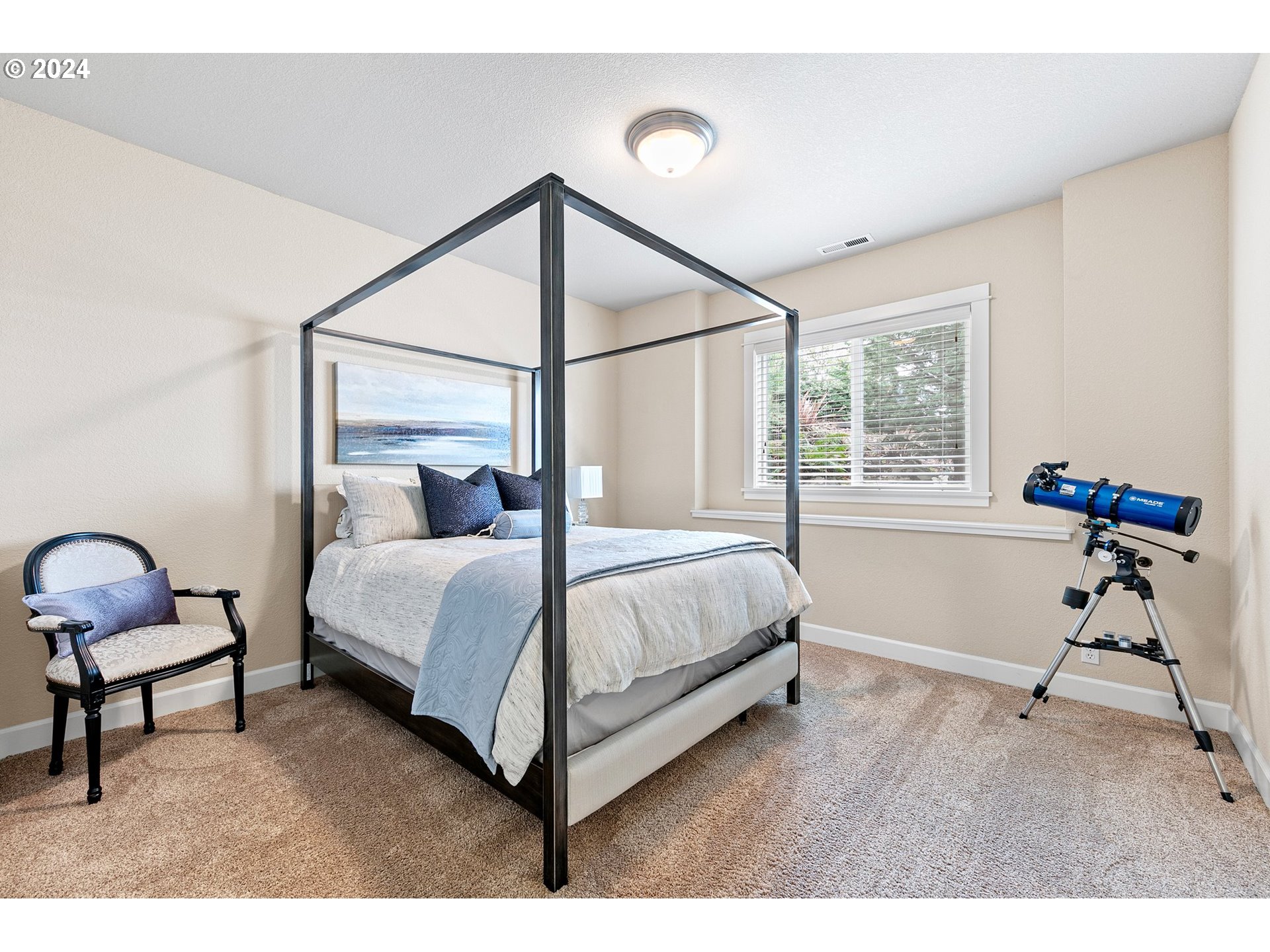 3321 Bentley Avenue Eugene, OR 97405 - Photo 24 of 48 a bedroom with a bed chair and a window