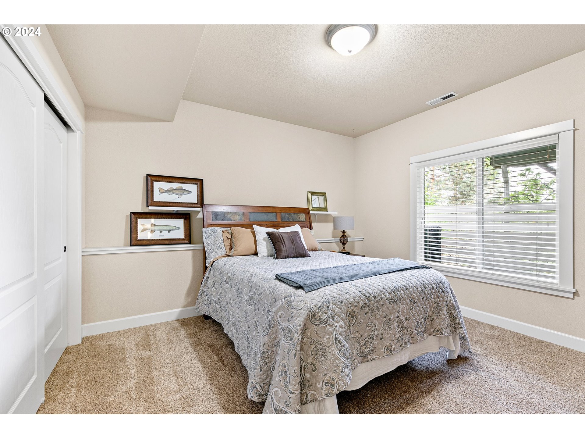 3321 Bentley Avenue Eugene, OR 97405 - Photo 25 of 48 a bedroom with a bed and a window