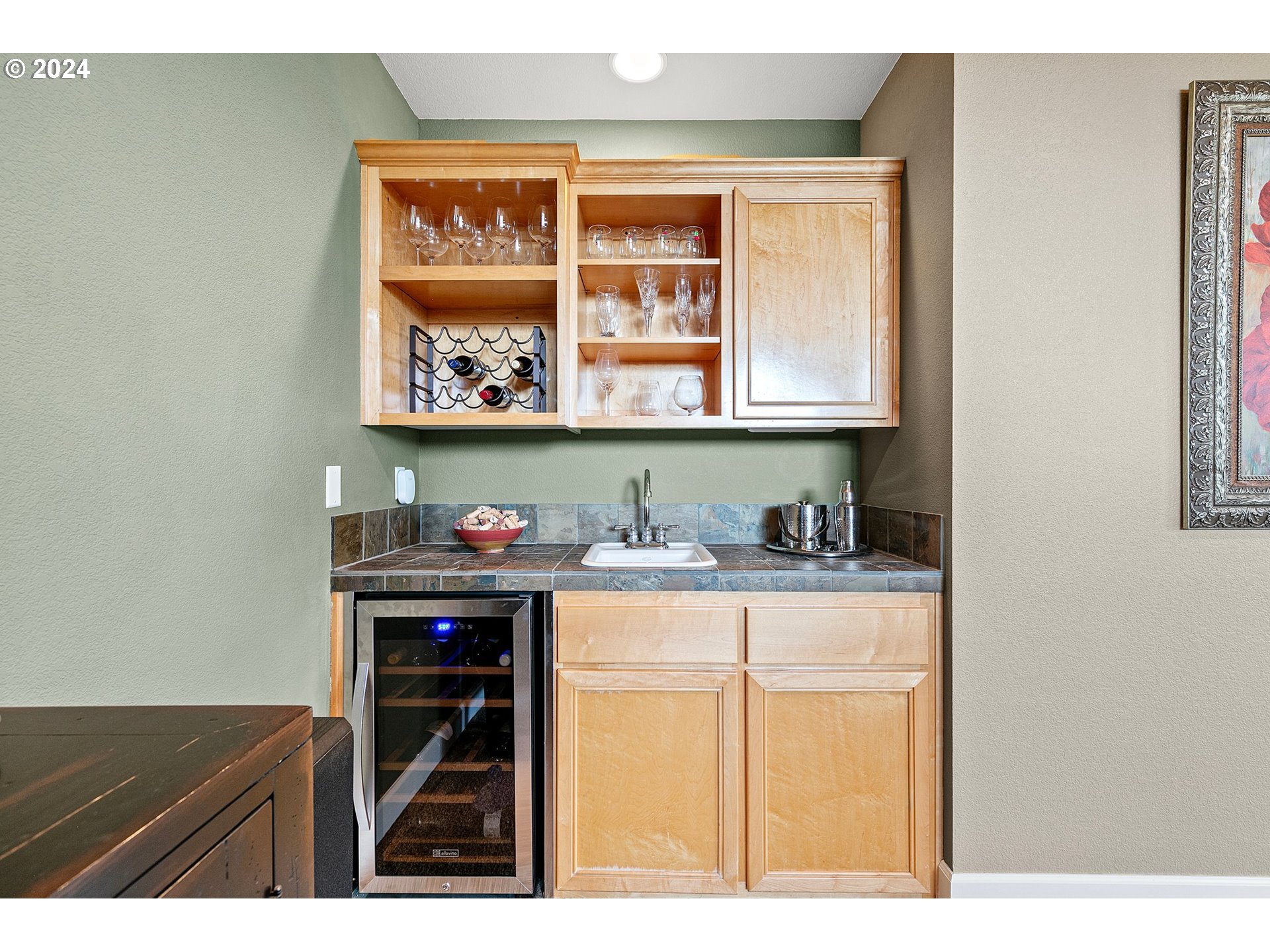 3321 Bentley Avenue Eugene, OR 97405 - Photo 33 of 48 a kitchen with a sink and a refrigerator