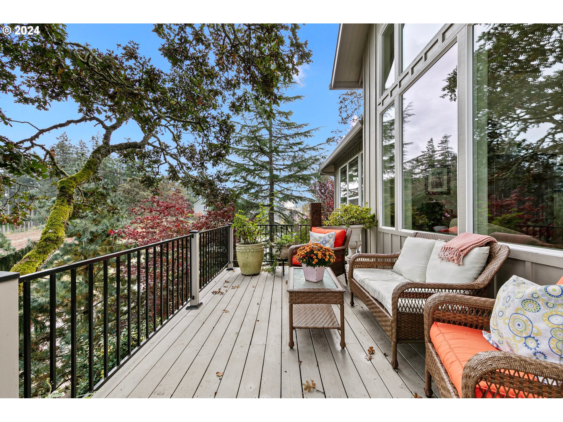 3321 Bentley Avenue Eugene, OR 97405 - Photo 38 of 48 a balcony with wooden floor and outdoor seating