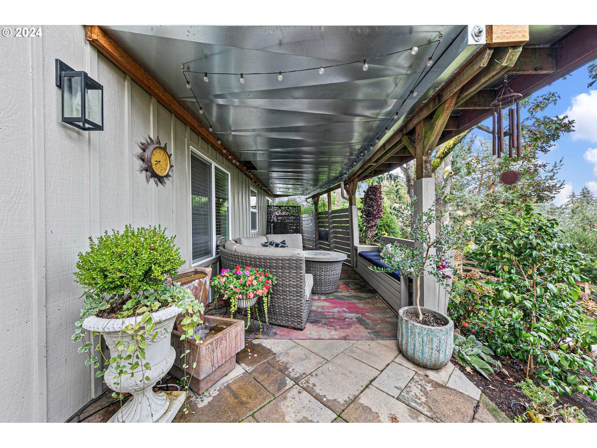 3321 Bentley Avenue Eugene, OR 97405 - Photo 39 of 48 a view of a chairs and table in a patio