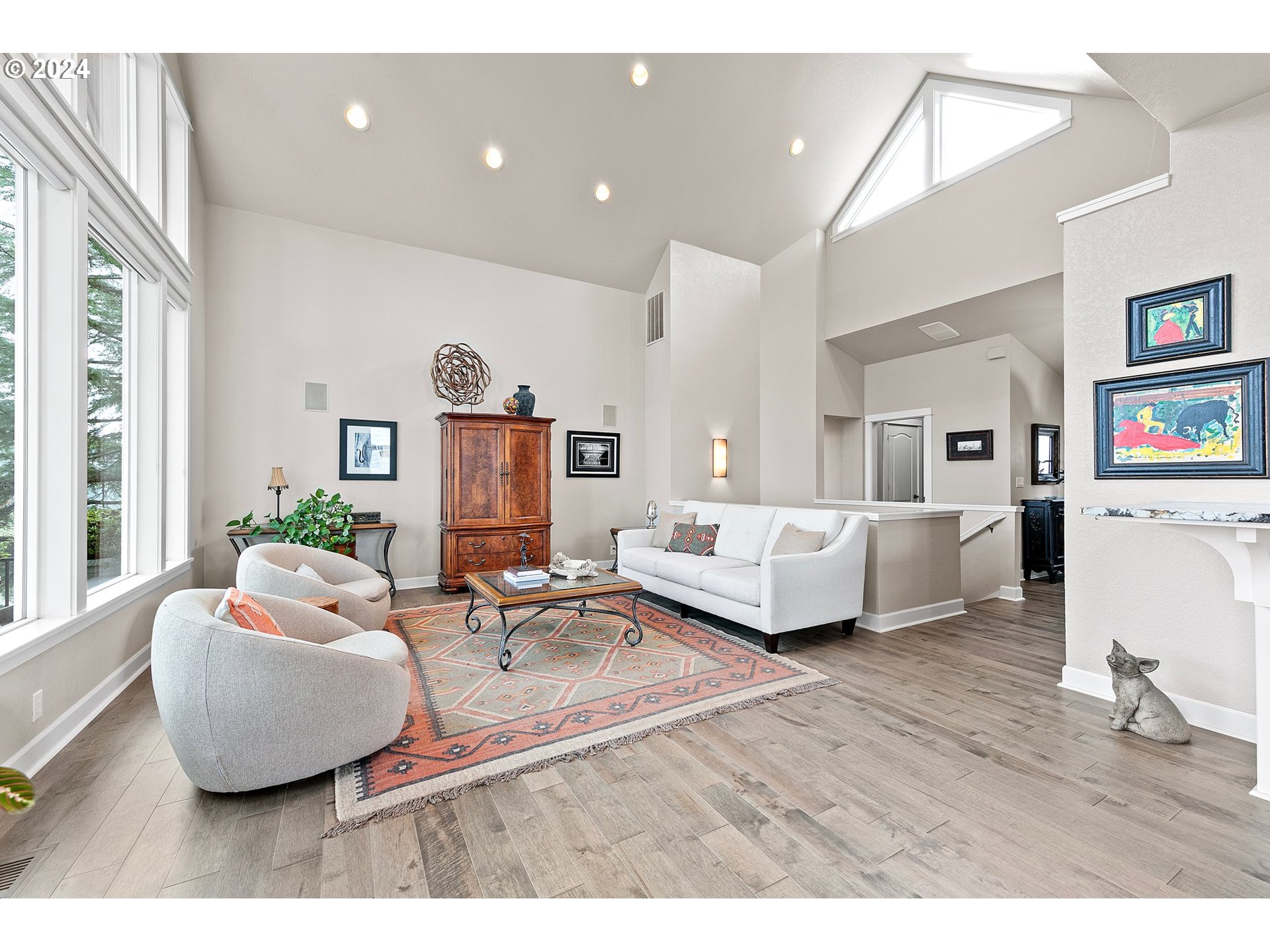 3321 Bentley Avenue Eugene, OR 97405 - Photo 5 of 48 a living room with furniture and a wooden floor